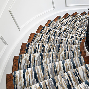 colorful custom stair runner on curved staircase